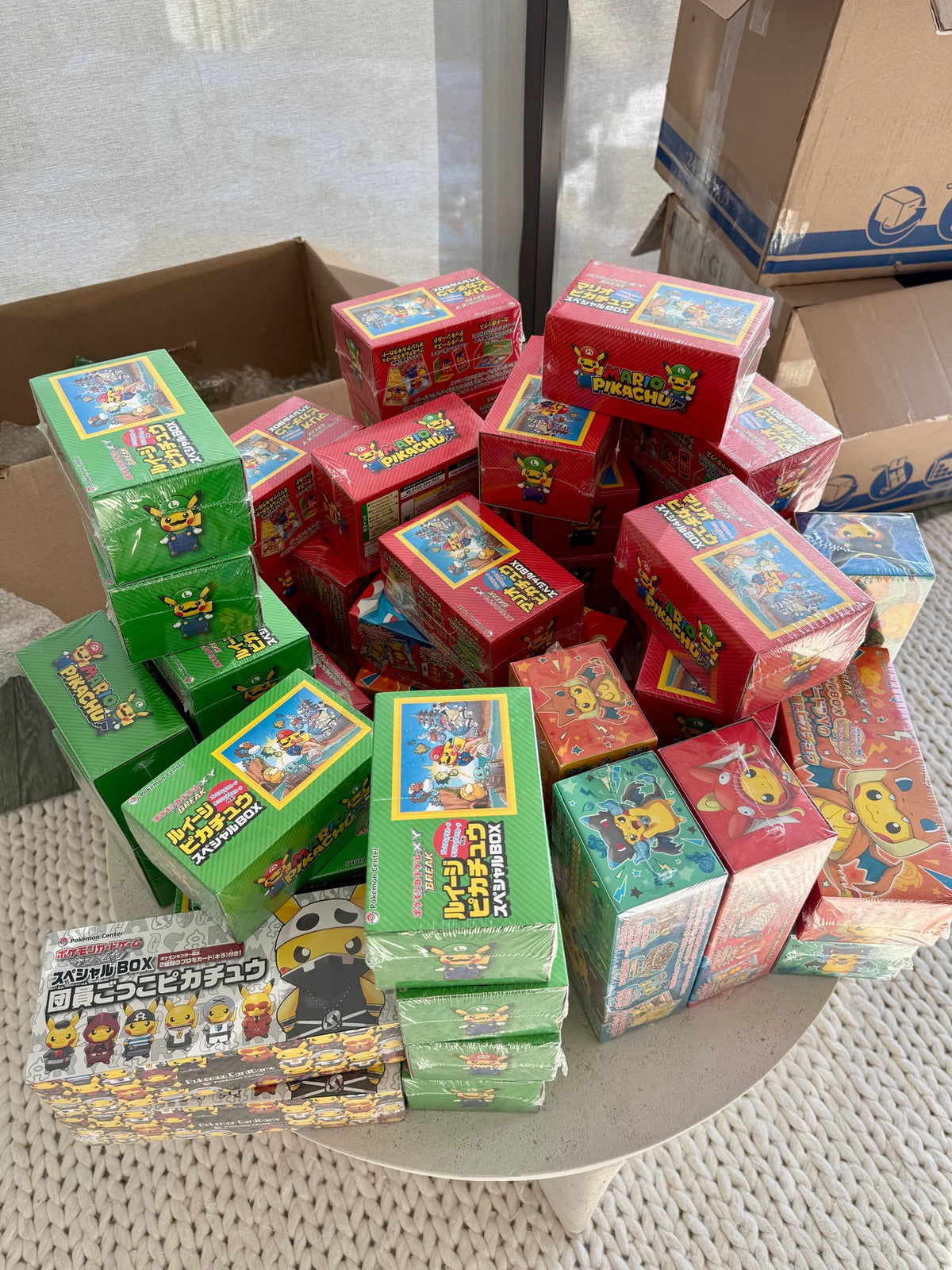 Sealed Mario, Luigi and Poncho Pikachu Pokemon boxes
